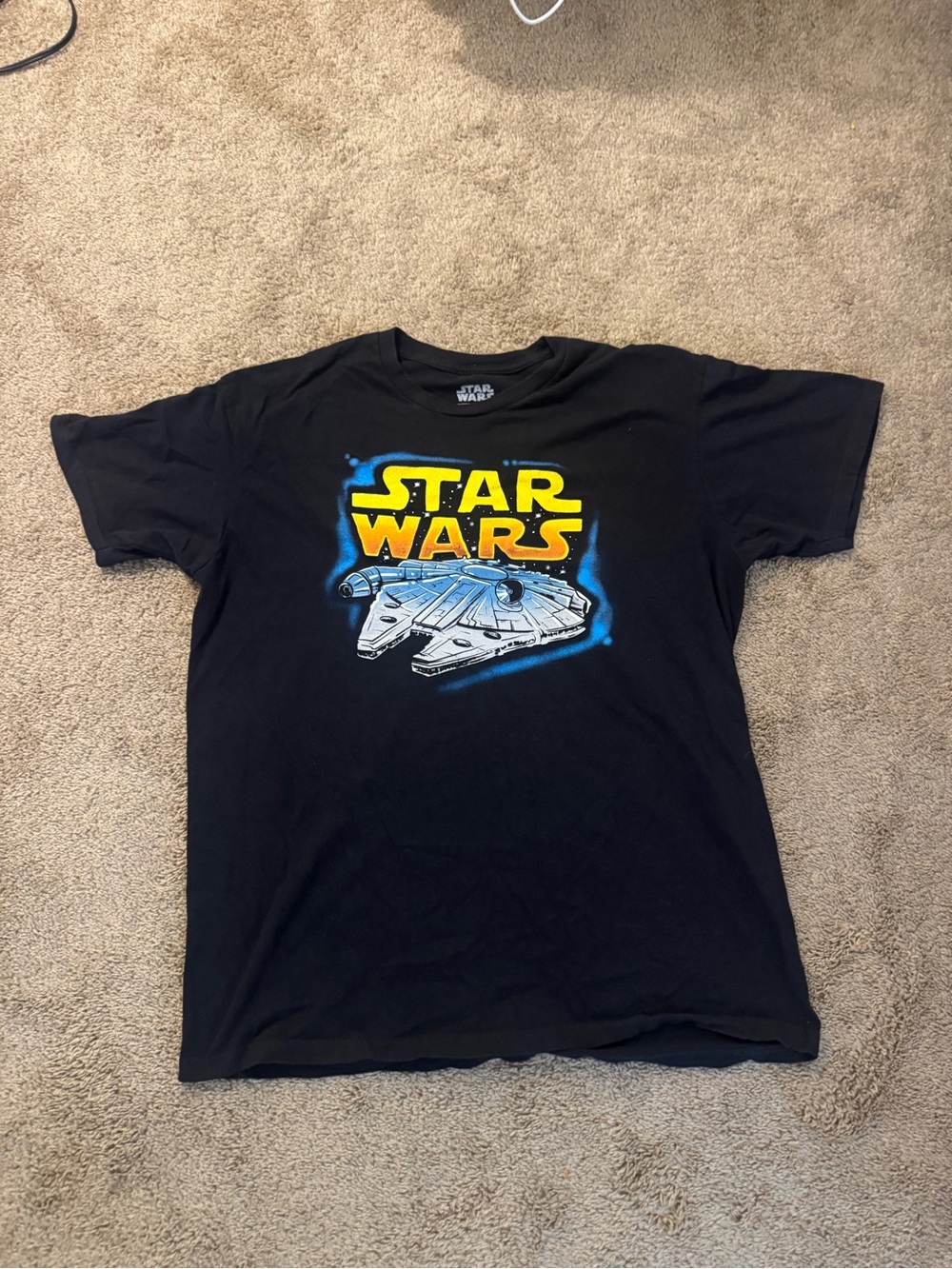 Star Wars Black Tee with Yellow Logo and Blue Millennium Falcon Graphic